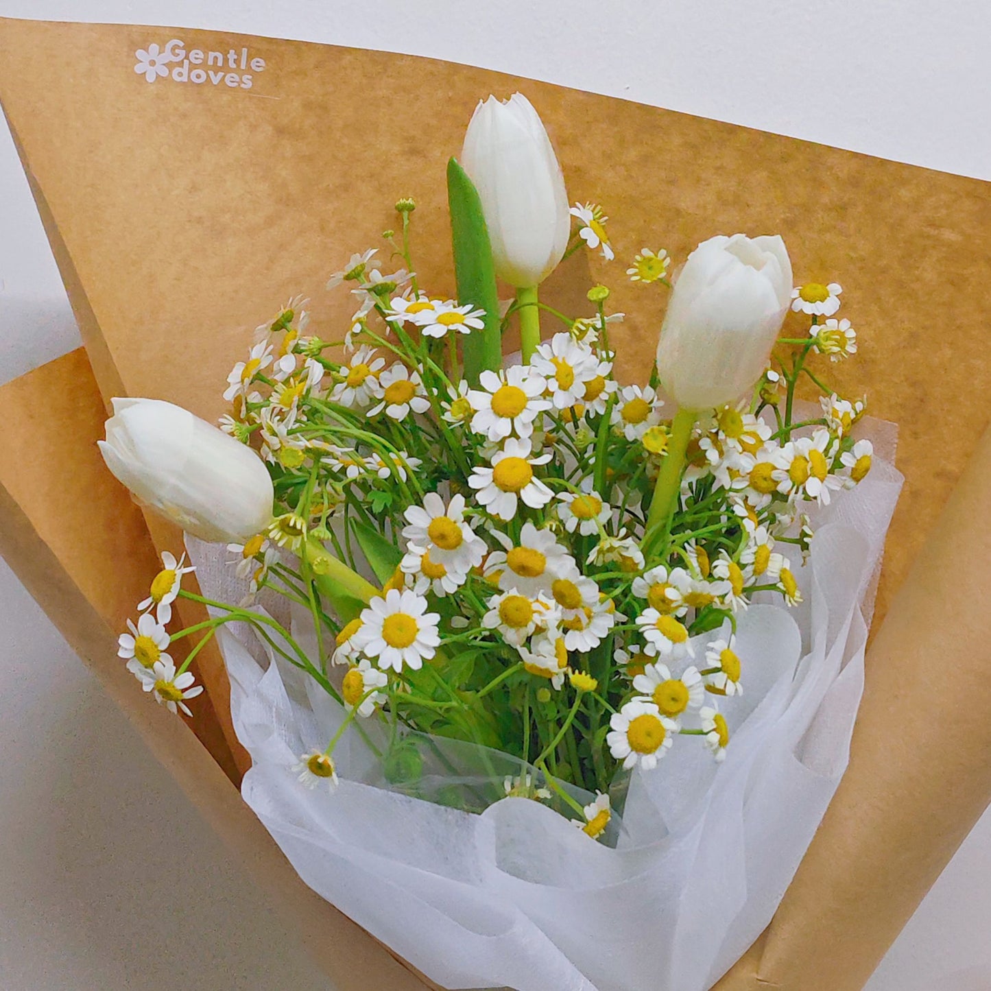 Three White Tulips with Daisies in Kraft Paper Bouquet