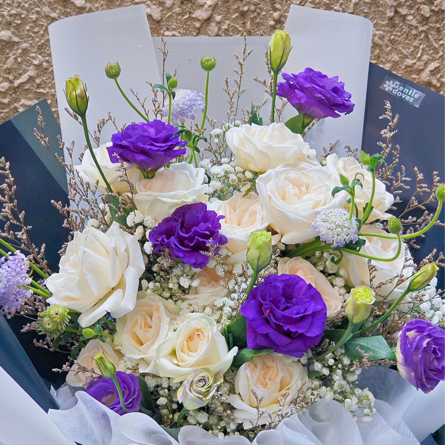 Fifteen White English Roses with Purple Lisianthus and Delicate Foliage Extra Large Bouquet
