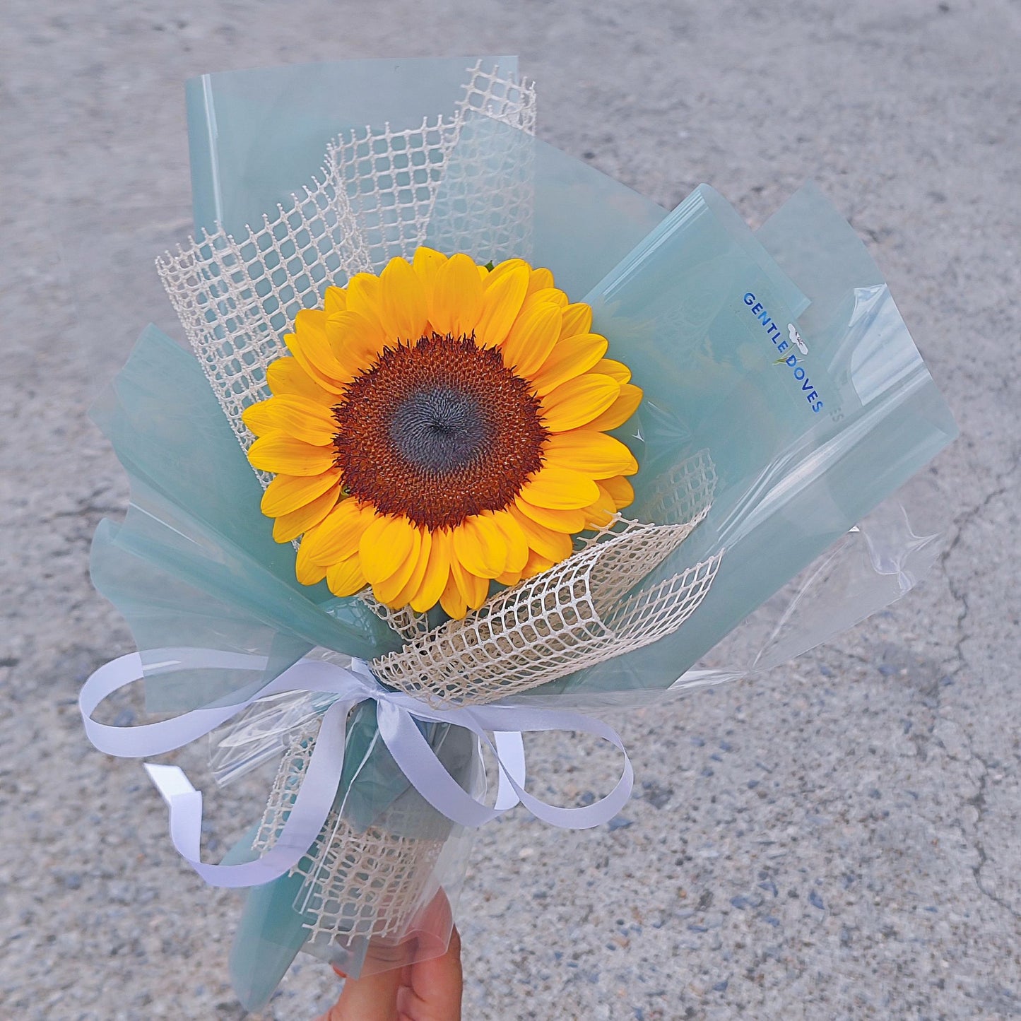 Single Sunflower in Soft Green and Mesh Paper Minimal Bouquet