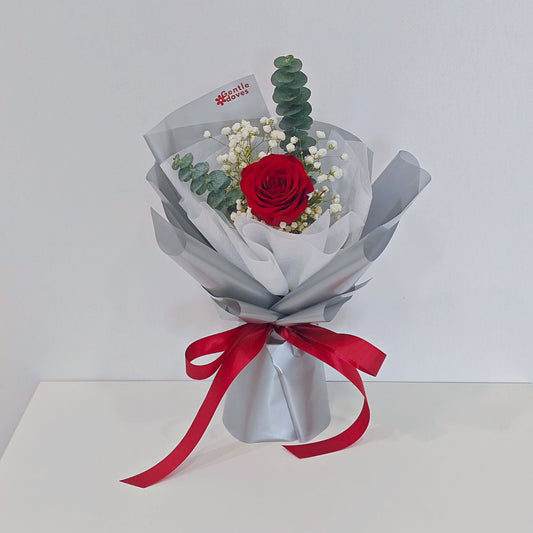 Single Imported Red Rose with Gypsophila and Eucalyptus in Silver-Gray Paper Bouquet