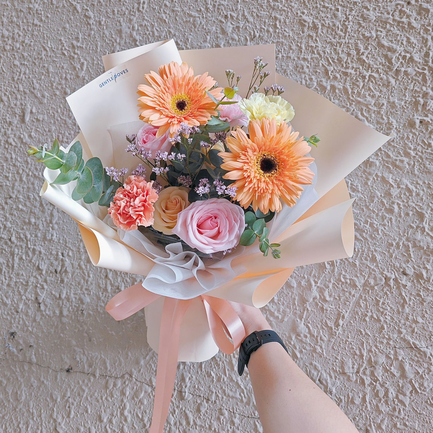 Assorted Soft Yellow-Orange and Pink Flowers in Soft Yellow Paper Small Bouquet