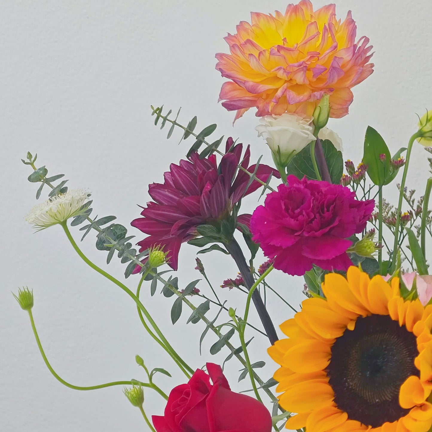 Assorted Purple, Red and Yellow Vivid Colors in Large Vase Arrangement