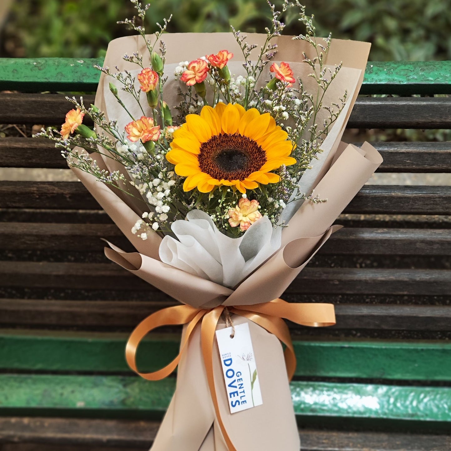 Single Sunflower with Warm Sprayed Carnations and Filler Flowers Bouquet