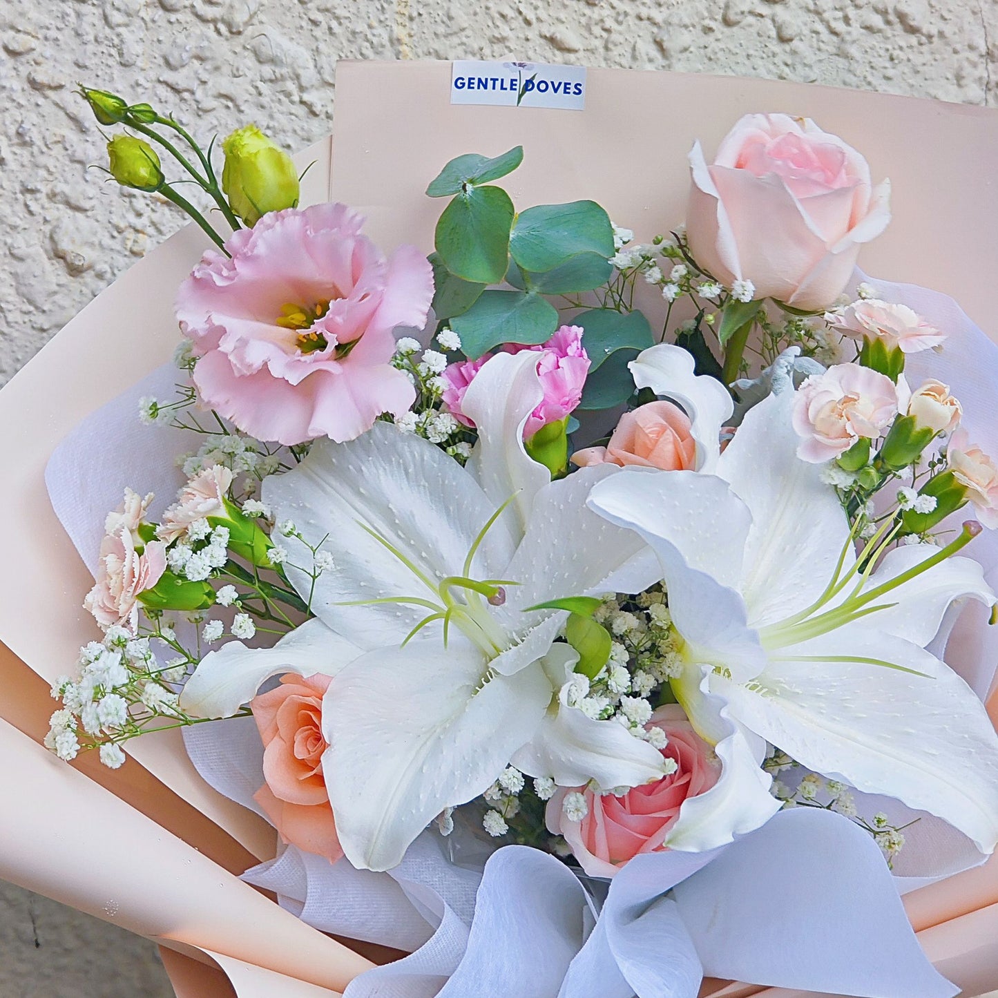 Two White Lilies with Soft Peach and Pink Flowers Bouquet