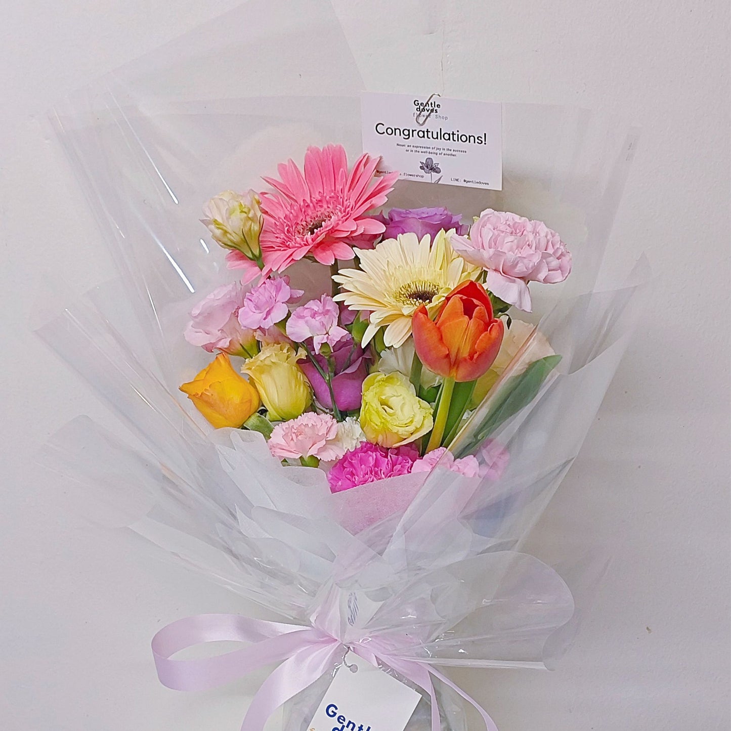 Assorted Coloful Flowers in Pink, White and Orange in Transparent Paper Bouquet