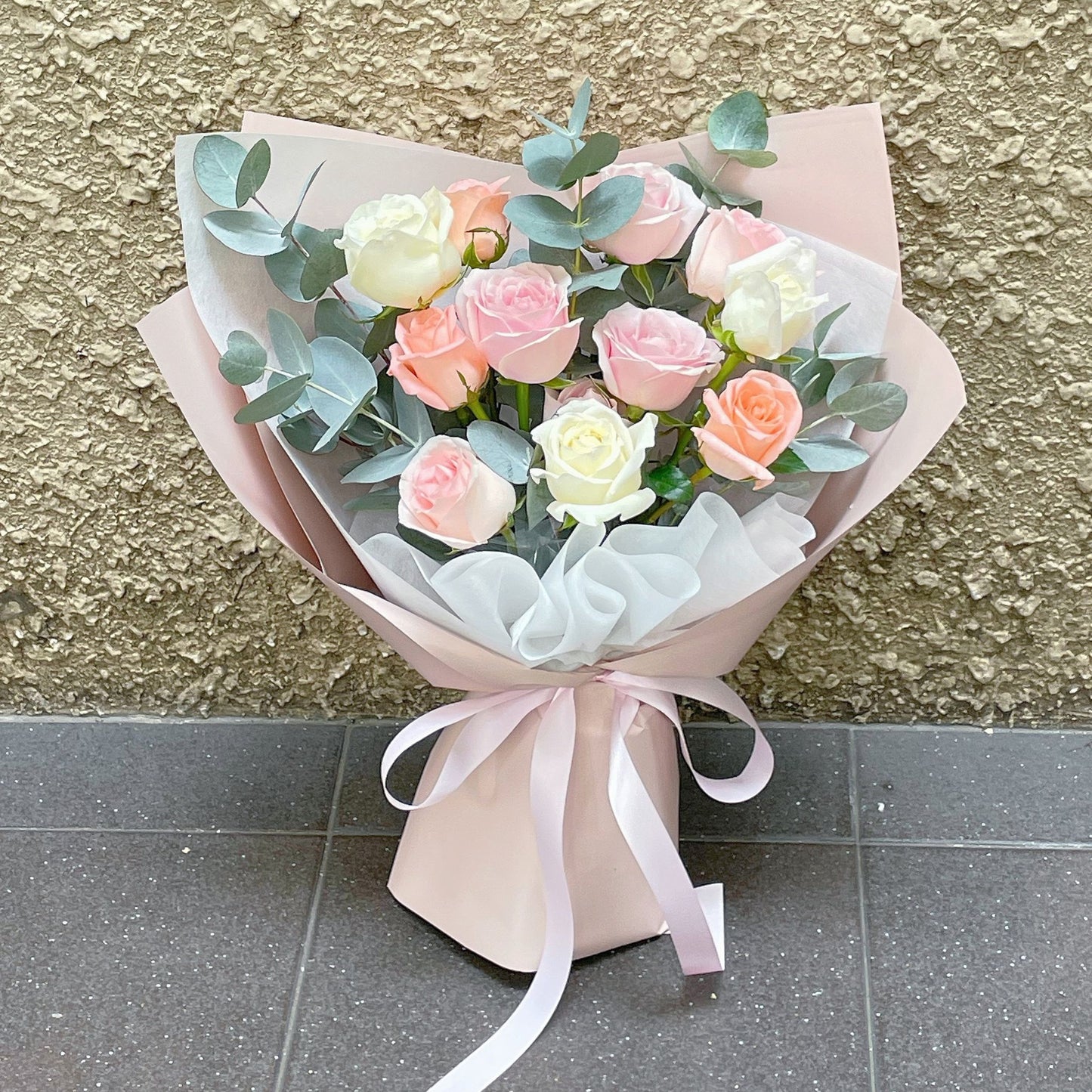 Twelve Soft Color Roses with Eucalyptus Bouquet