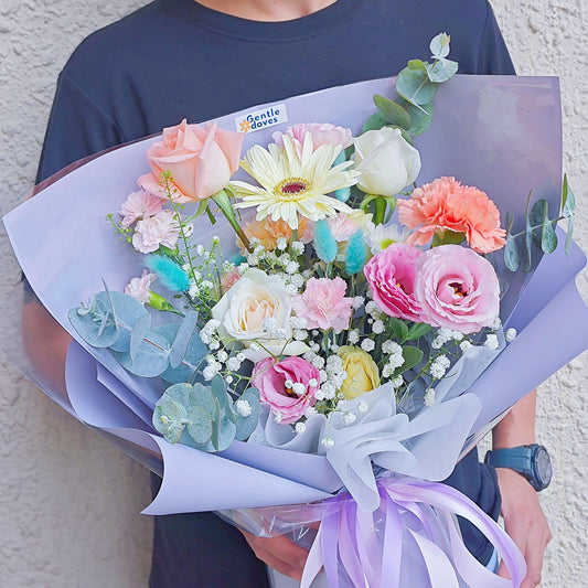 Assorted Colorful Flowers in Purple Paper Medium Size Bouquet