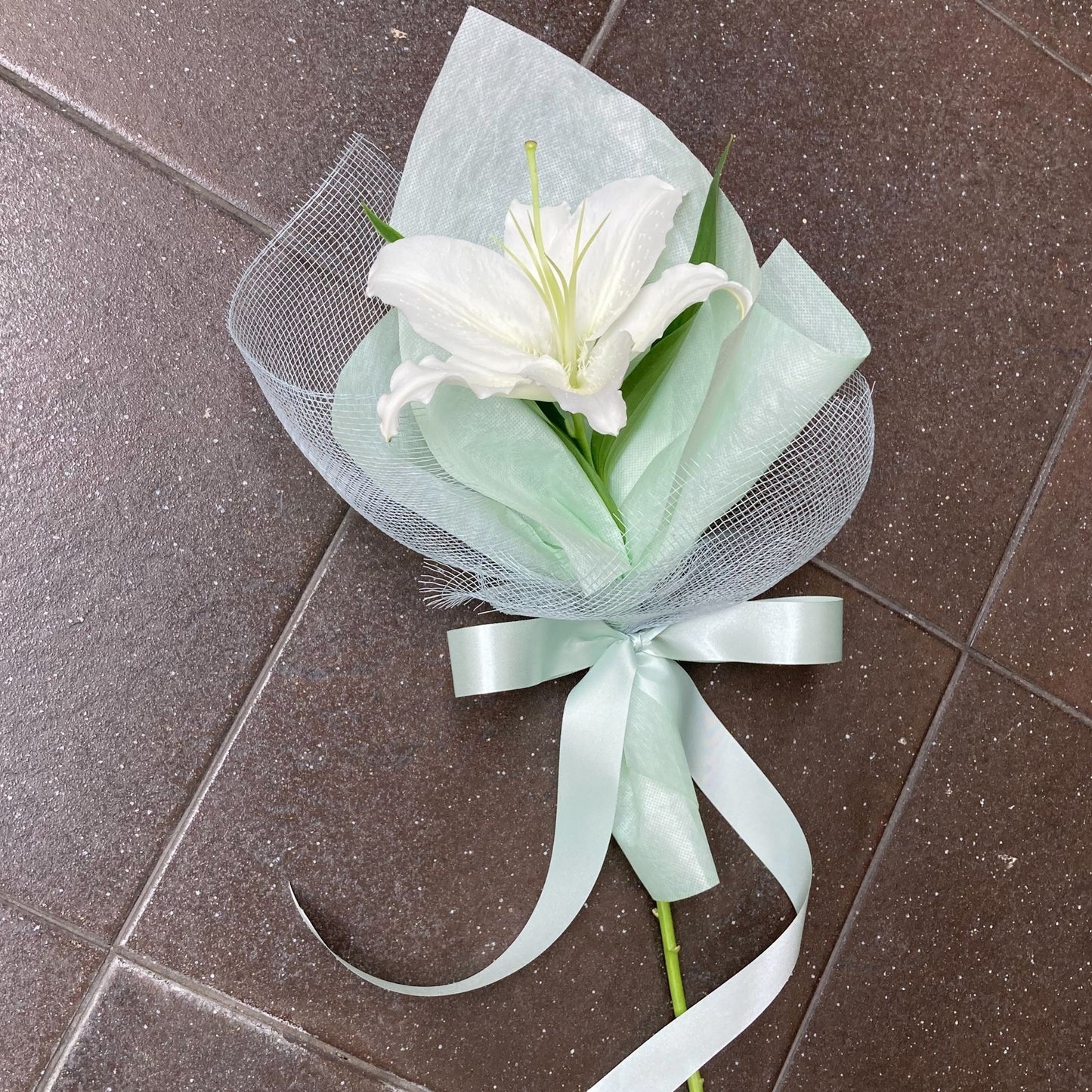 Single White Lily in Green Paper Minimal Bouquet