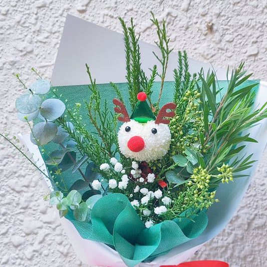 ช่อดอกไม้ กวางเรนเดียร์ และ ใบไม้แซมสีเขียว ธีมคริสต์มาส