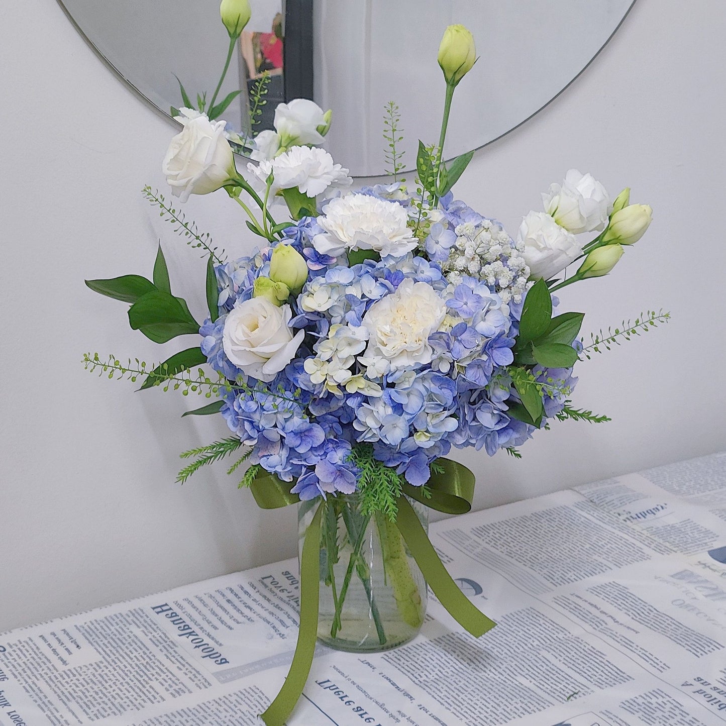 Blue Hydrangea with Assorted White Flower and Green Foliage in Medium Vase Arrangement