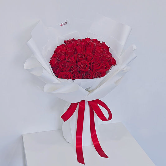 Forty Red Roses in White Paper Bouquet