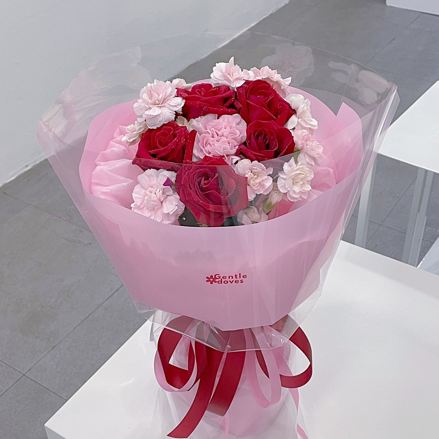 Five Red Roses with Assorted Pink Carnations Bouquet