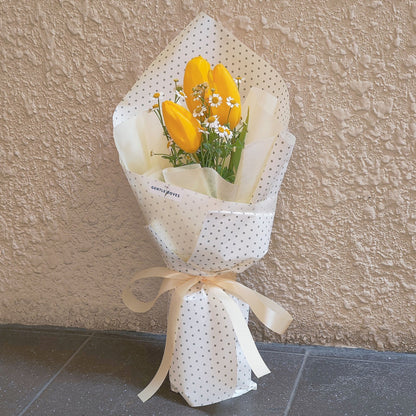 Three Yellow Tulips with Daisies in Dot Pattern Bouquet