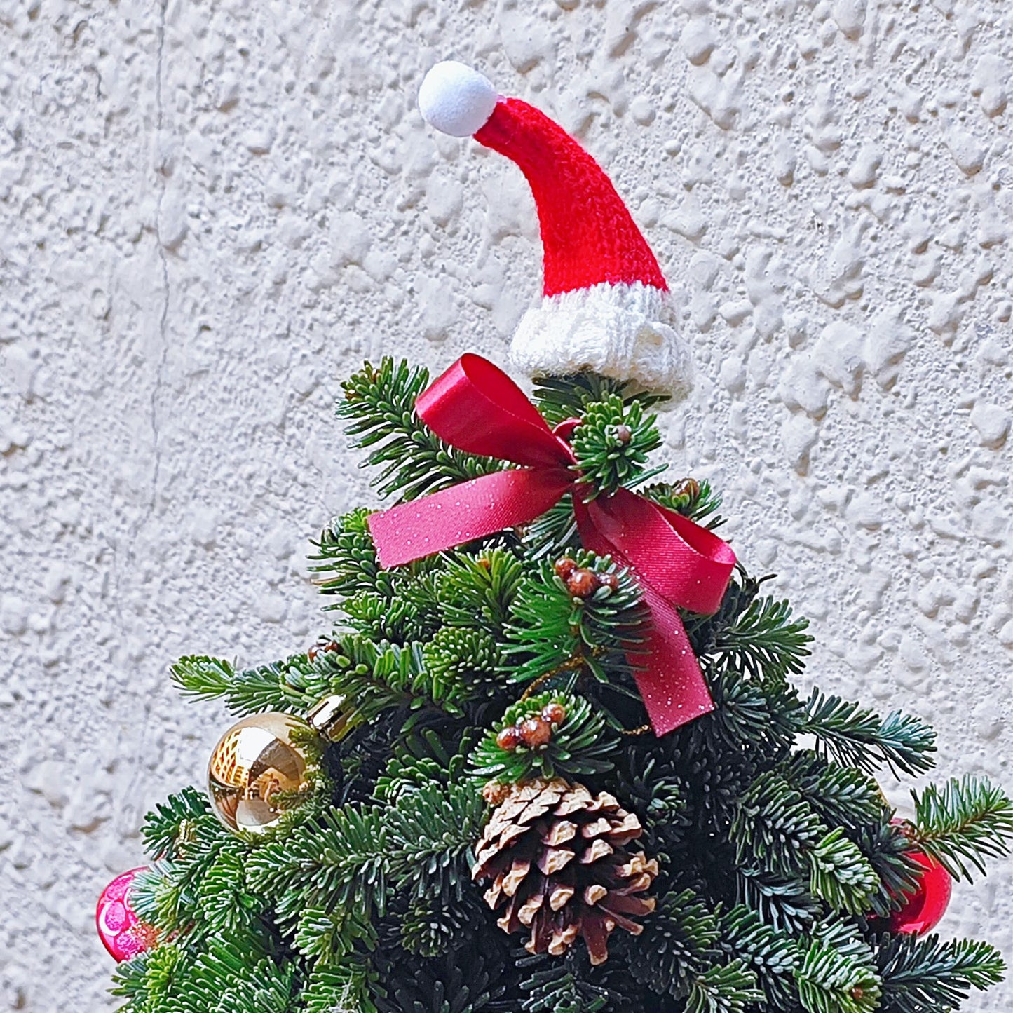 Decorated Christmas Tree in Small Ceramic Vase Arrangement