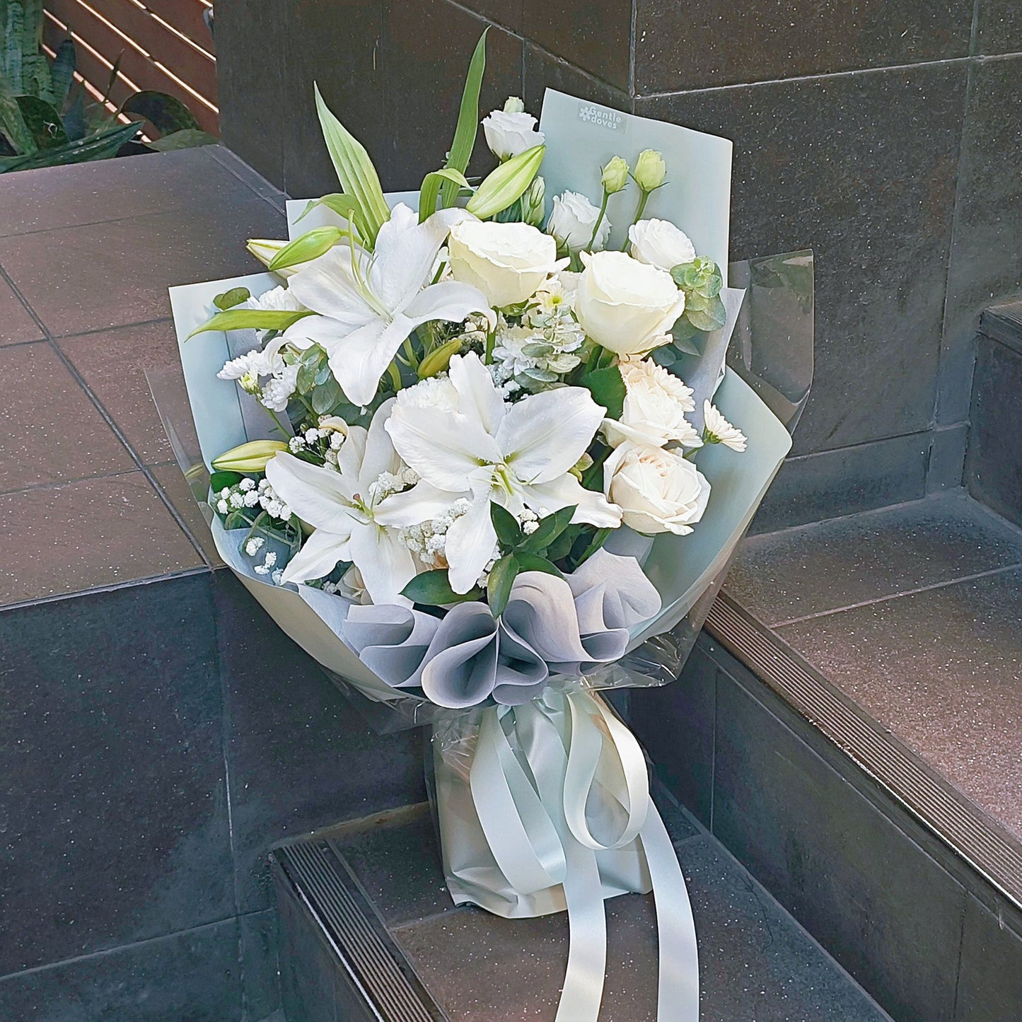 Blooming White Lilies and White Roses in Pastel Green Paper Large Bouquet