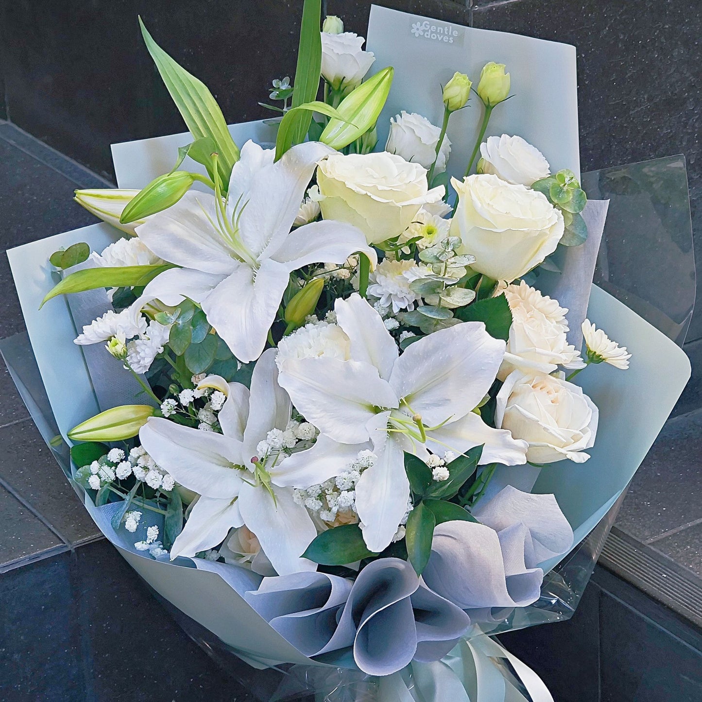 Blooming White Lilies and White Roses in Pastel Green Paper Large Bouquet