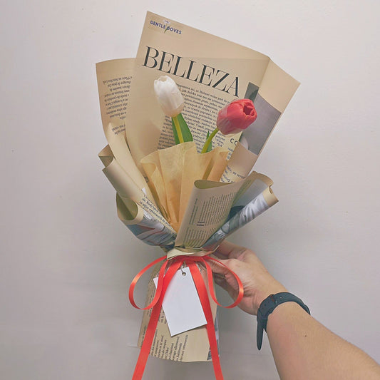 Two White and Orange Tulips in Brown Newspaper Paper Bouquet