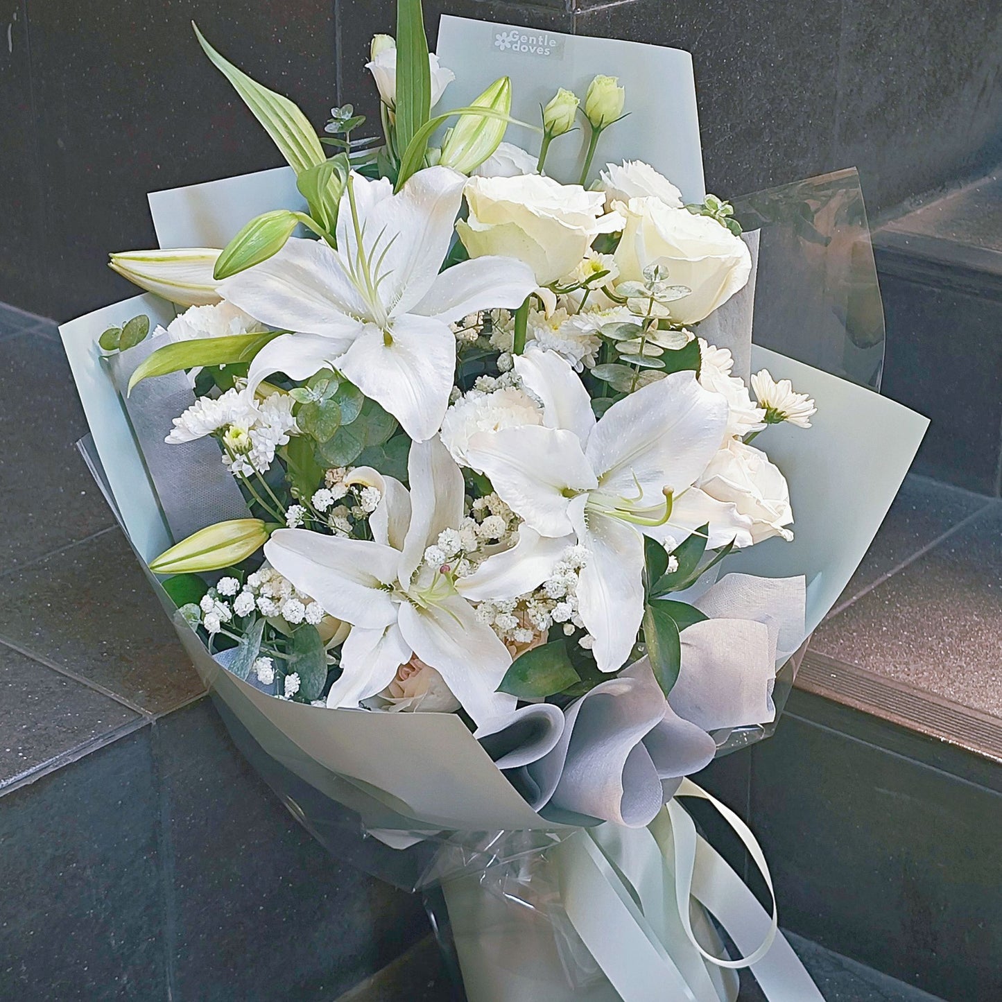 Blooming White Lilies and White Roses in Pastel Green Paper Large Bouquet