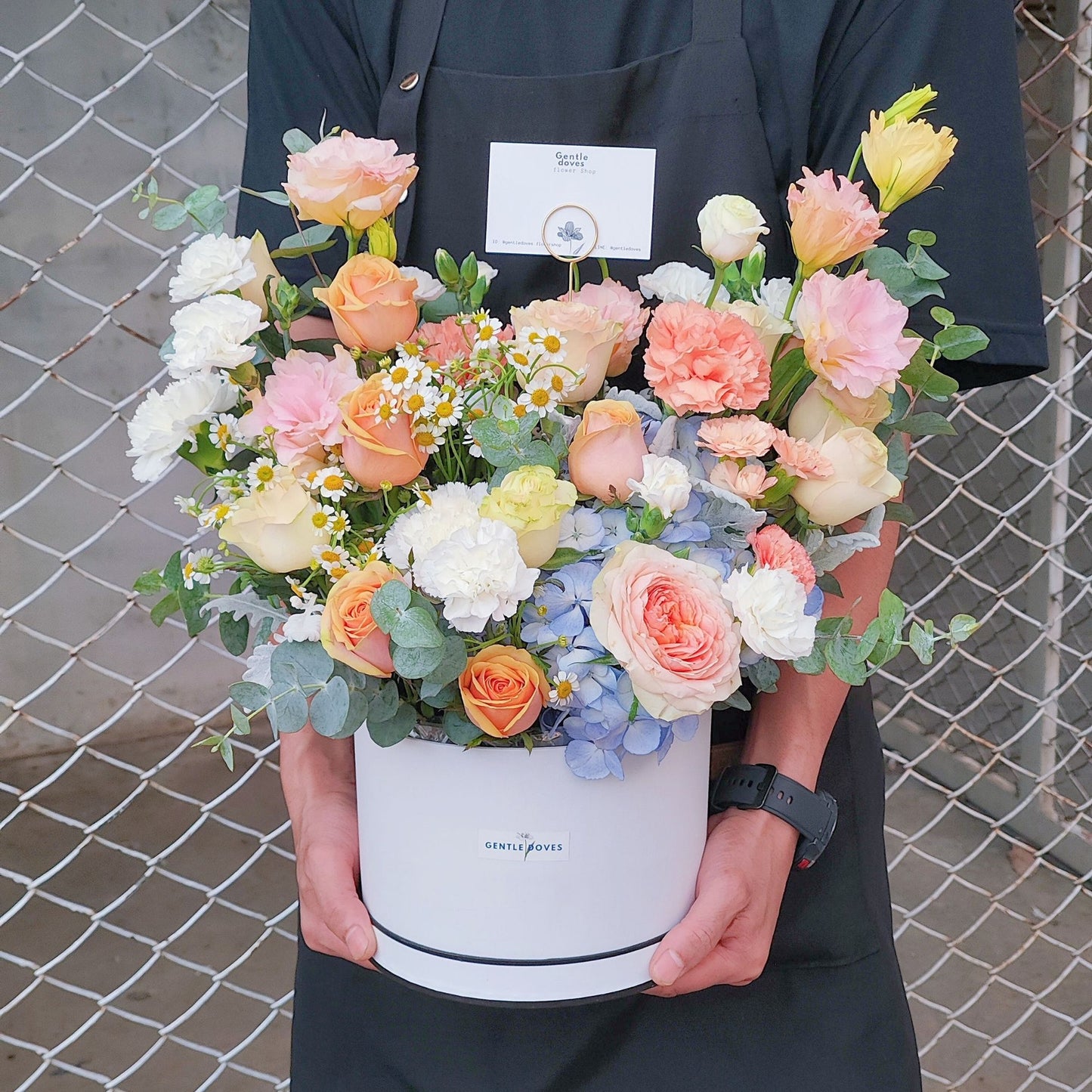 Assorted Orange Flowers in Medium Box Arrangement