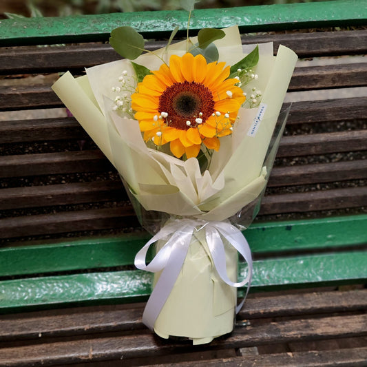 Single Sunflower with Gypsophila in Pastel Green Paper Bouquet