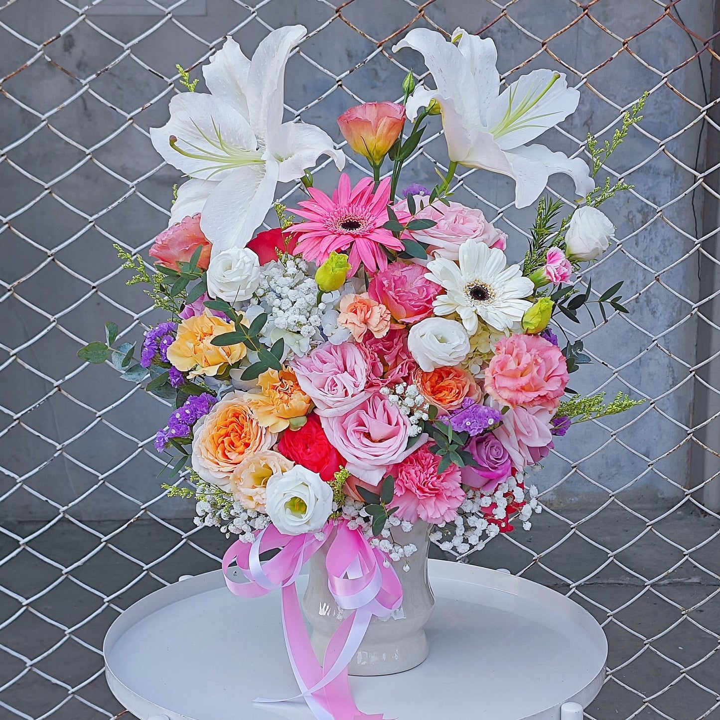 Assorted Colorful Vivid Flowers with Lilies in Large Ceramic Vase Arrangement