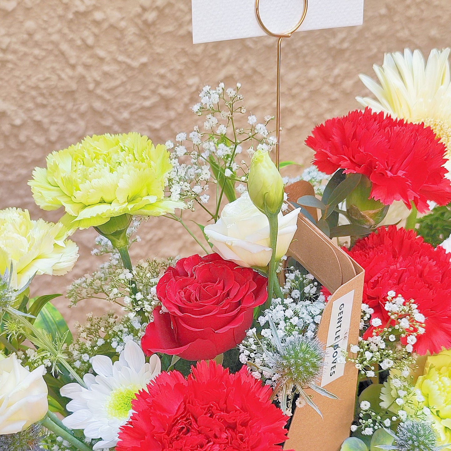 Assorted Red and Green Flowers in Carrying Small Box