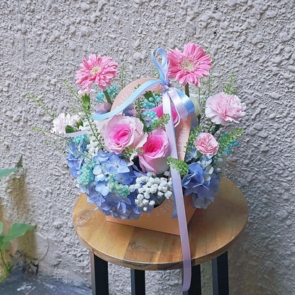 Assorted Pink and Blue Flowers in Carrying Mini Box Arrangement