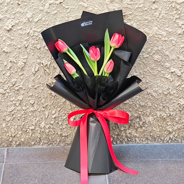 Five Red Tulips in Black Paper Bouquet