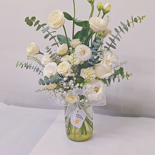 Assorted White Flowers and Roses with Green Foliage in Medium Vase Arrangement