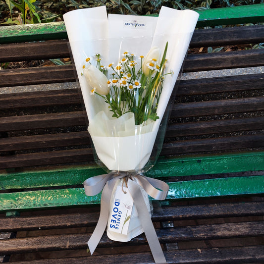 Two White Tulips with Daisies in Cylinder Wrapping Bouquet