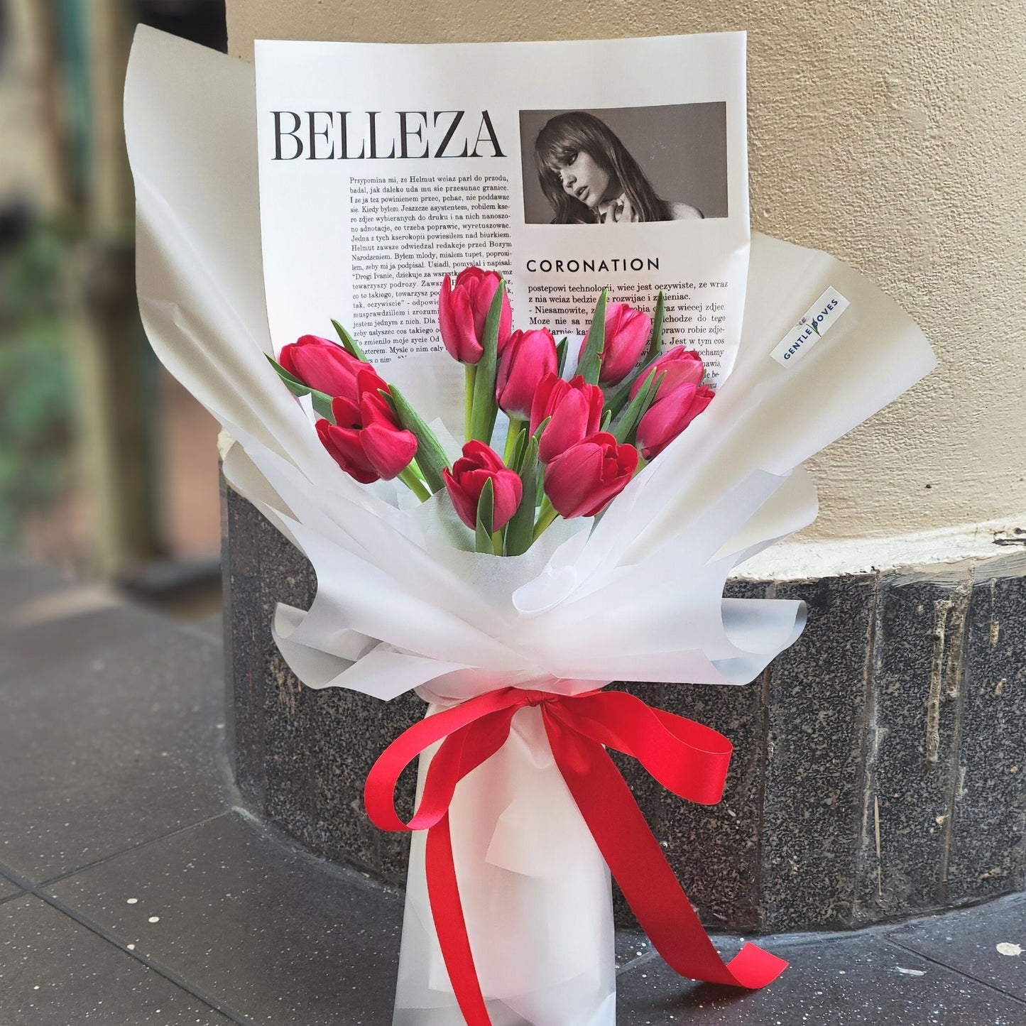 Ten Red Tulips in Newspaper and Matte Paper Bouquet