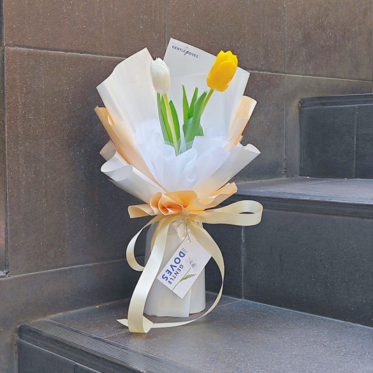 Two White and Yellow Tulips in White and Soft Yellow Paper Bouquet