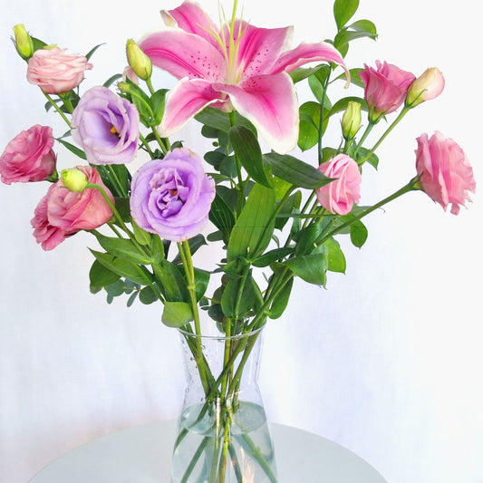 Assorted Color Lisianthus with Pink Lilies in Large Vase Arrangement