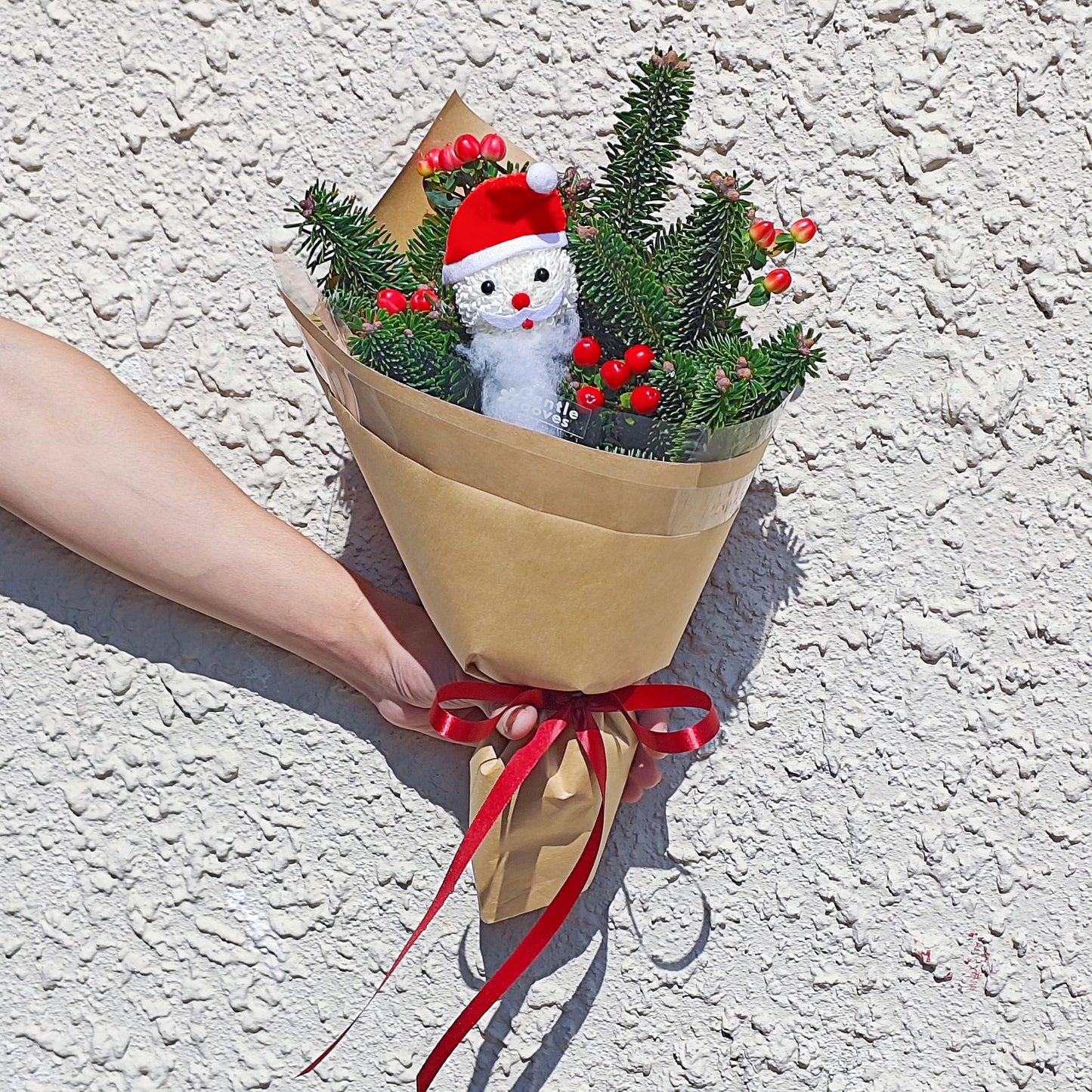 Fresier Firs and Red Berries with Little Santa Small Bouquet