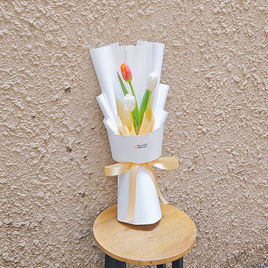 Three White and Orange Tulips in White and Warm Yellow Paper Bouquet
