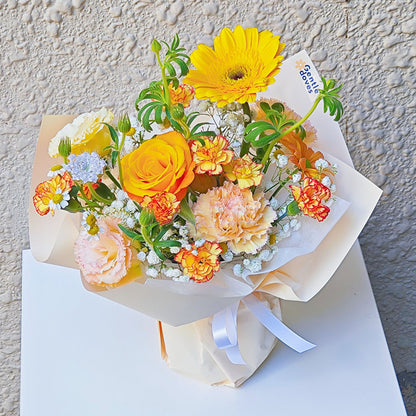 Assorted Yellow and Orange Flowers with Green Foliage Small Vase Arrangement