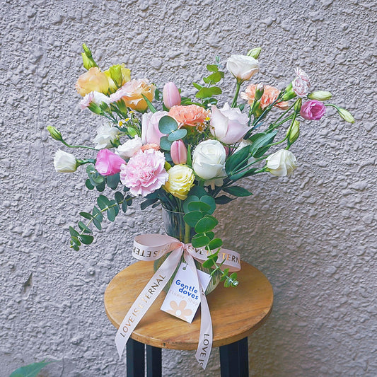 Assorted Soft Colors Flowers in Large Vase Arrangements