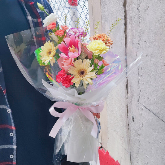 Assorted Colorful Flowers in Transparent Paper Bouquet