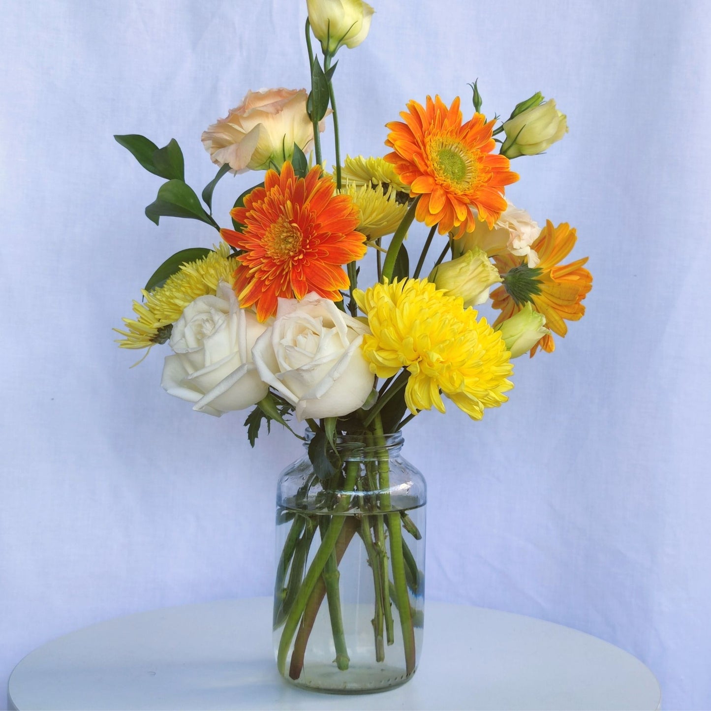 Orange Flowers with White Roses in Medium Vase Arrangement