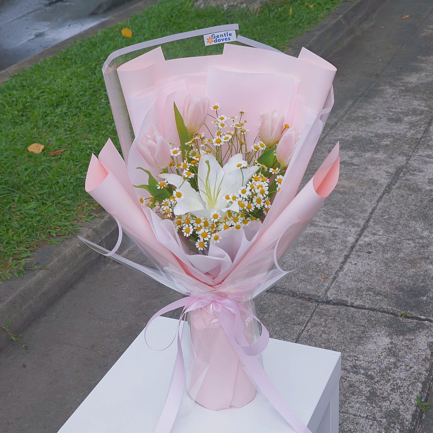 Four Pink Tulips with Lily and Daisies Bouquet
