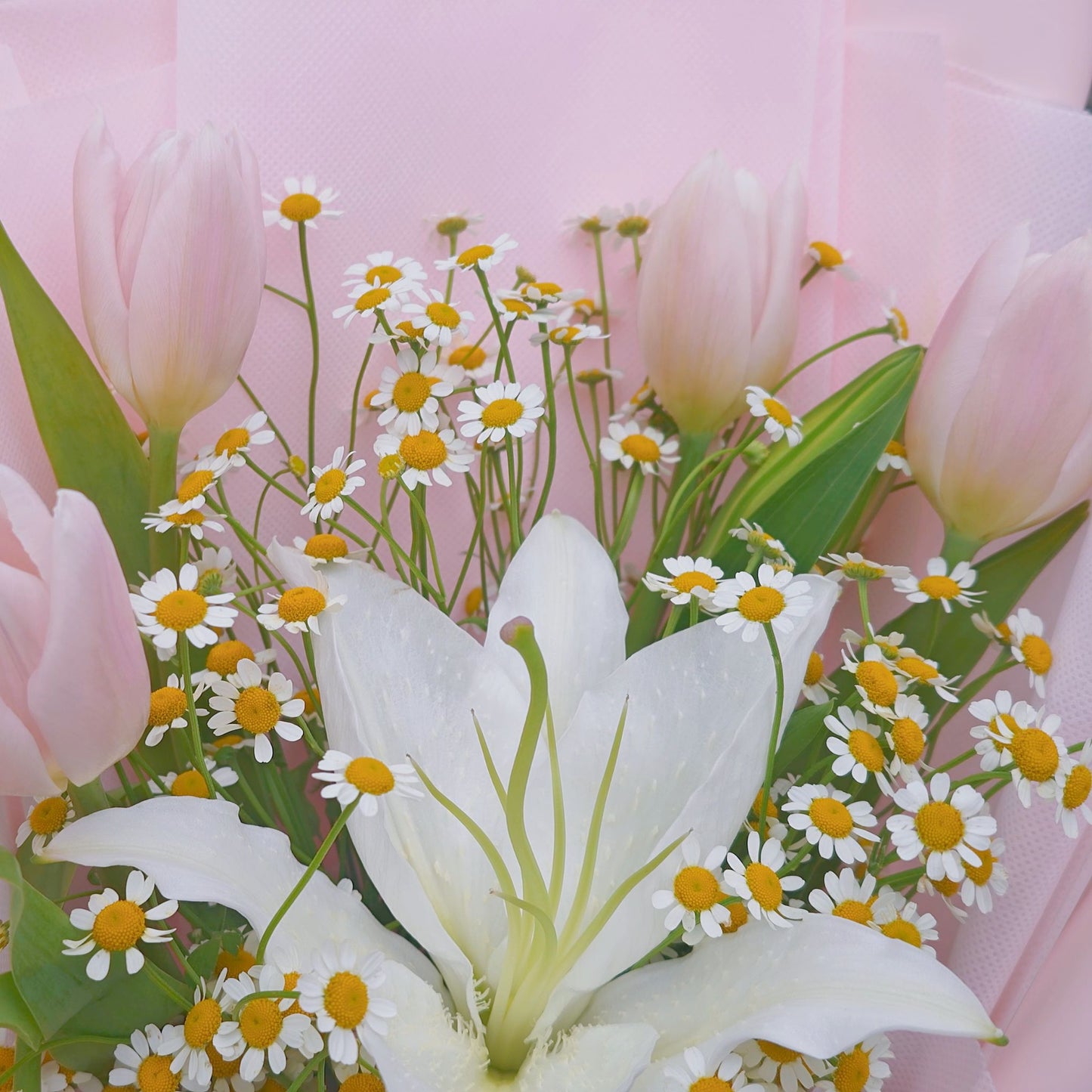 Four Pink Tulips with Lily and Daisies Bouquet