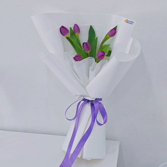 Six Purple Tulips in White Paper Bouquet