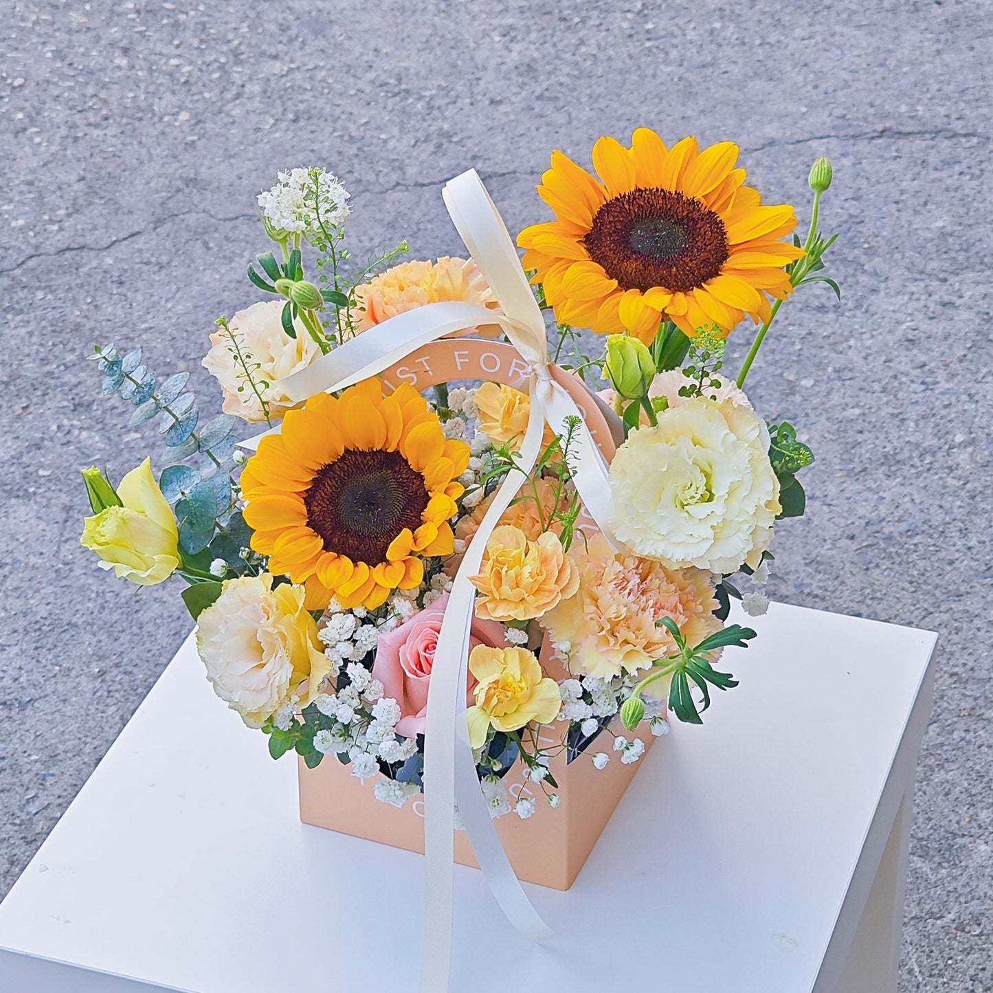 Assorted Yellow Flowers with Sunflowers in Carrying Mini Box Arrangement