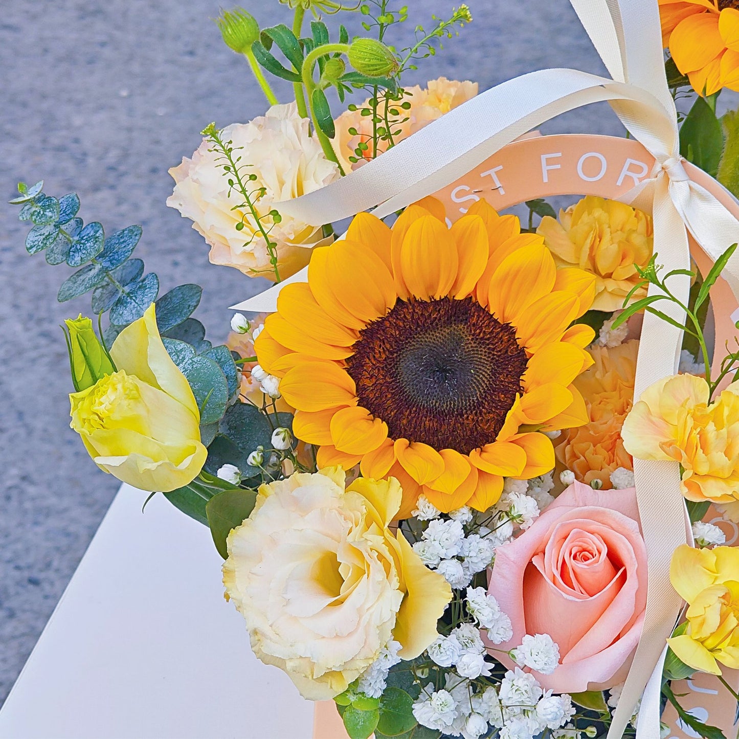 Assorted Yellow Flowers with Sunflowers in Carrying Mini Box Arrangement