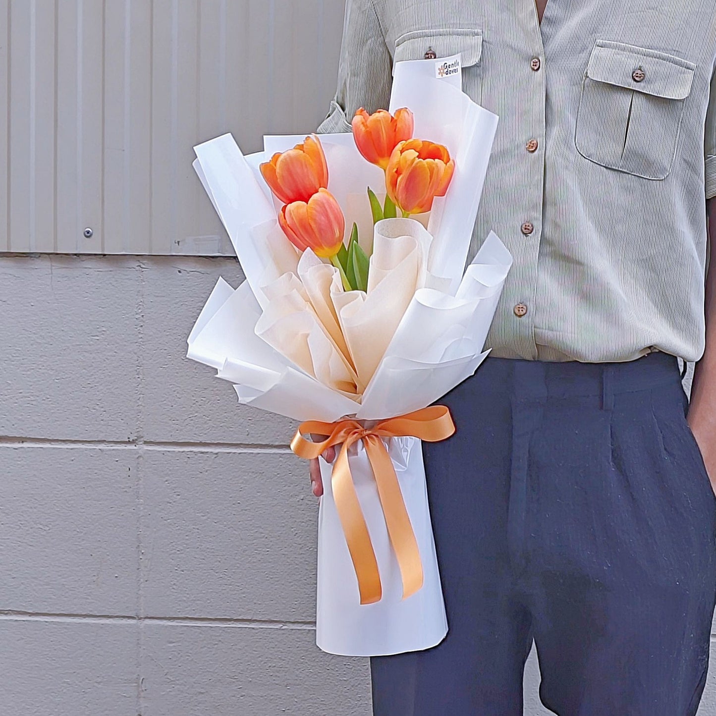 Four Orange Tulips in White Paper Minimal Bouquet