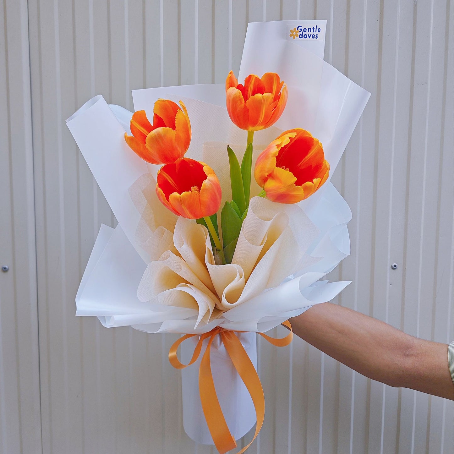 Four Orange Tulips in White Paper Minimal Bouquet