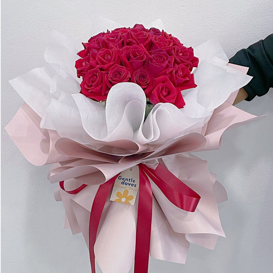 Red Roses in Fluffy Pink and White Wrap Bouquet