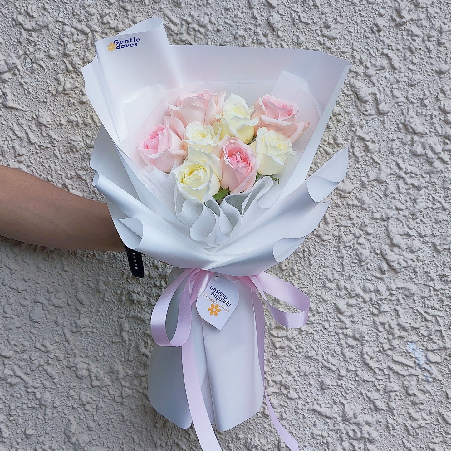 Eight White and Soft Pink Rose in White Paper Bouquet