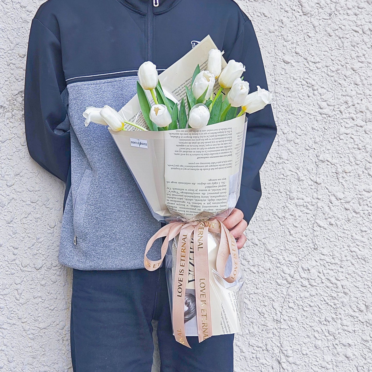 Ten White Tulips in Soft Brown Newspaper Bouquet