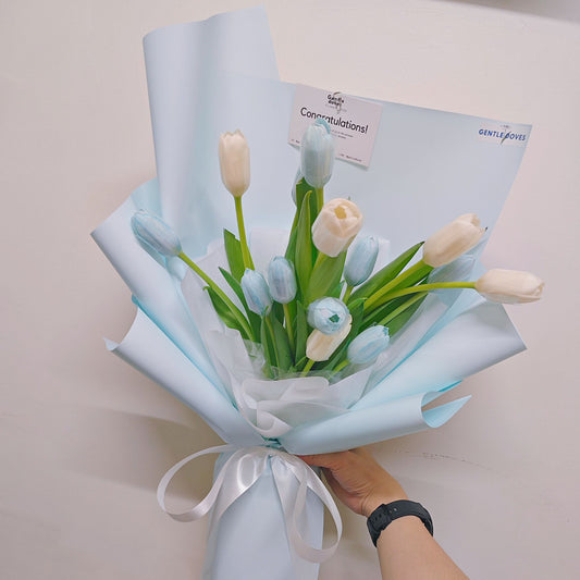 Fourteen Assorted White and Dyed Blue Tulips in Soft Blue Paper Bouquet